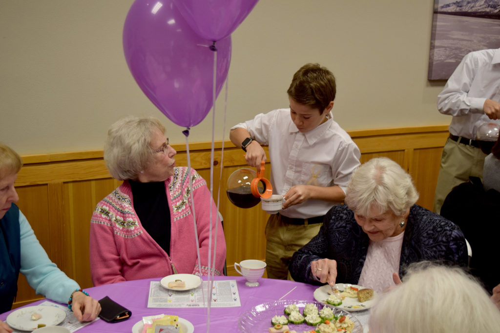 Three students from the leadership class at Hines Middle School volunteered to serve the tea and refreshments at Sip for the Cure.