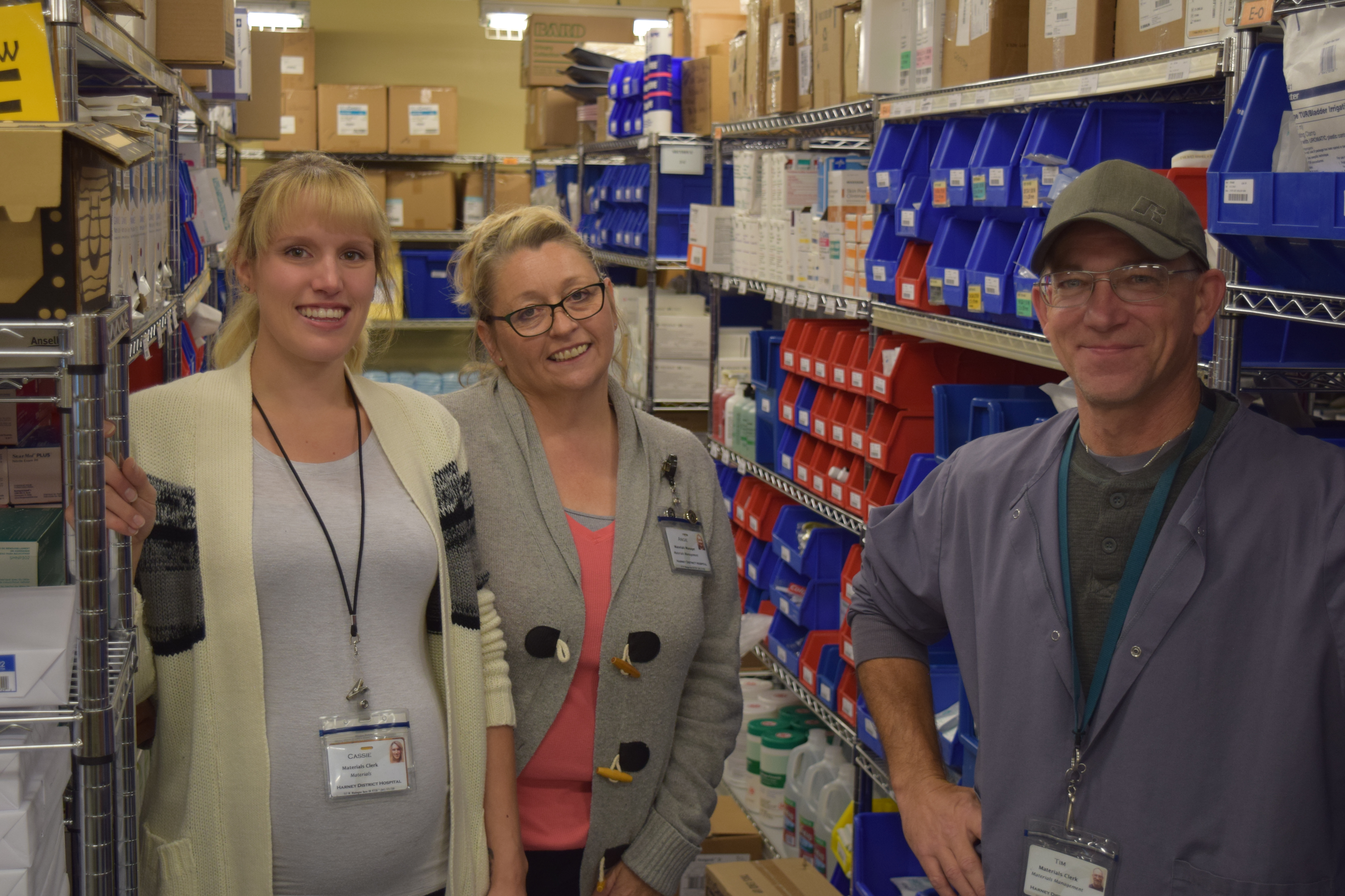 three pharmacy workers posing