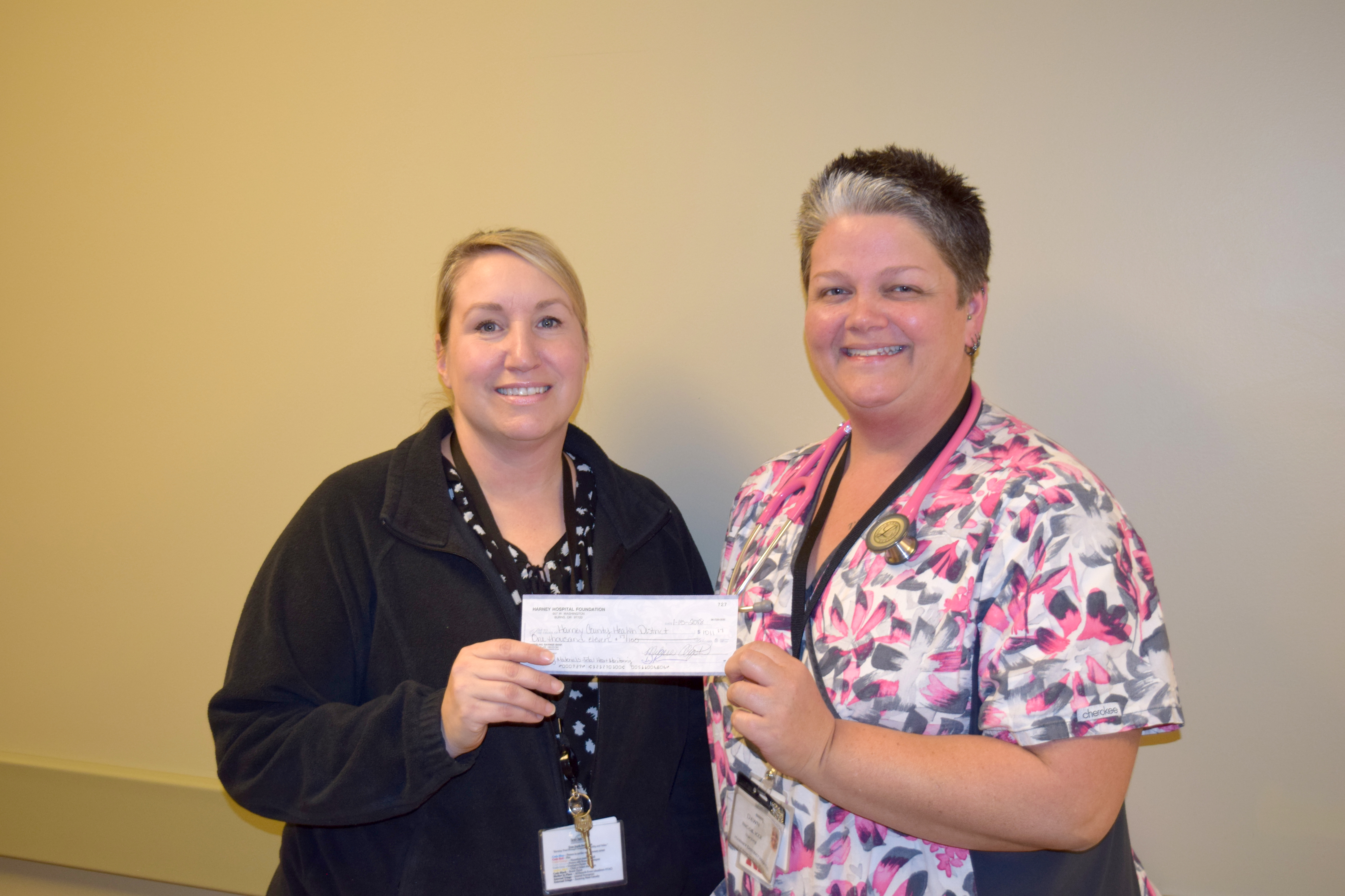 Harney Hospital Foundation Manager Jeni Stevens presents a check to HDH Nurse Dawn Marten for the purchase of fetal heart monitoring educational materials for HDH nursing staff.